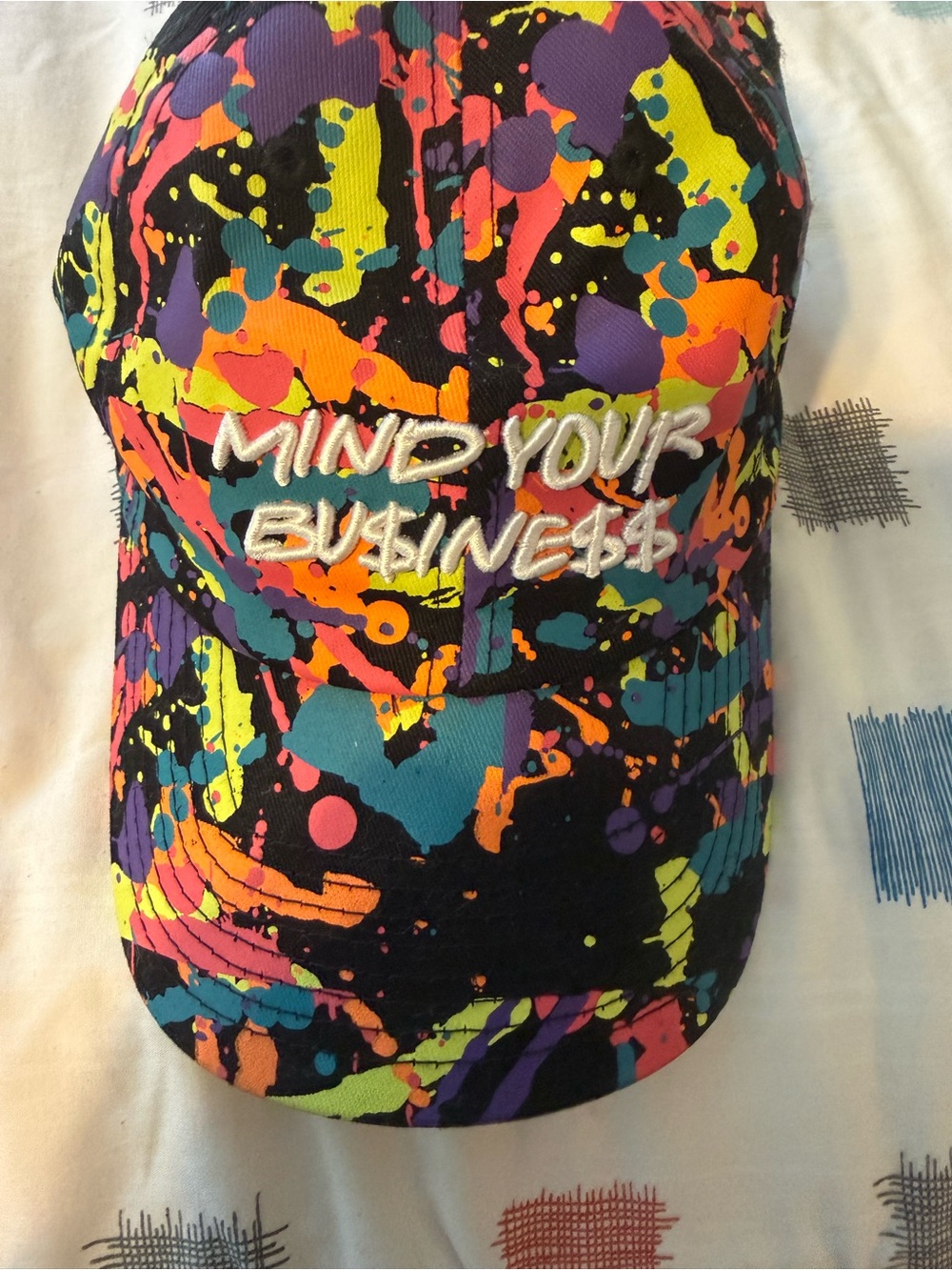 "Mind Your Business" Neon Splatter Baseball Cap